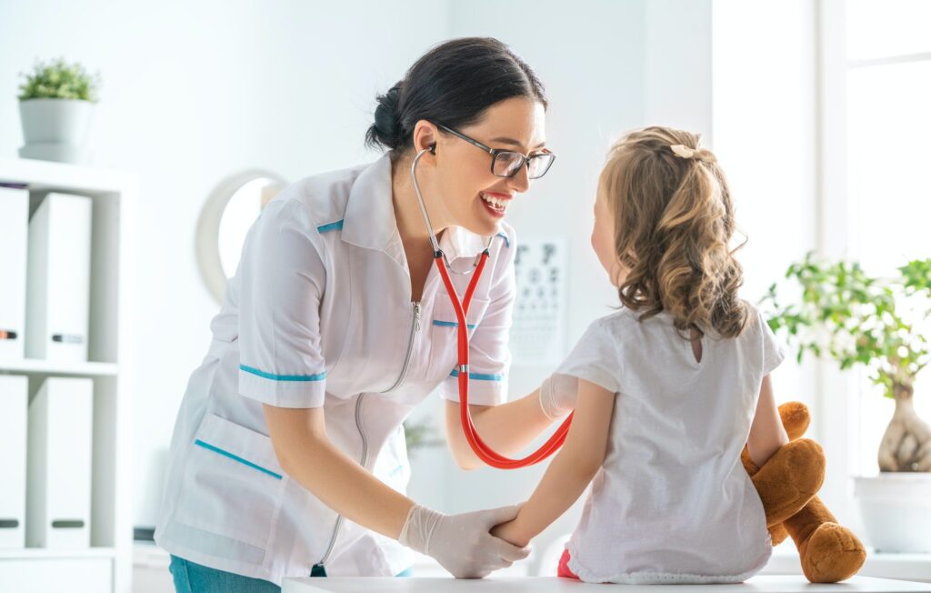 Doctor examining a child