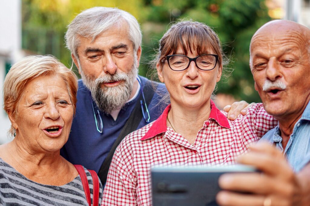 Elderly couples taking selfie with smartphone
