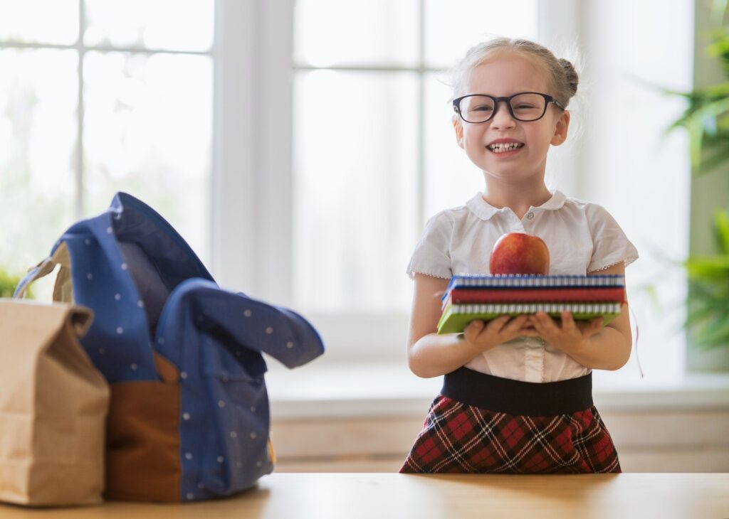 child preparing for school