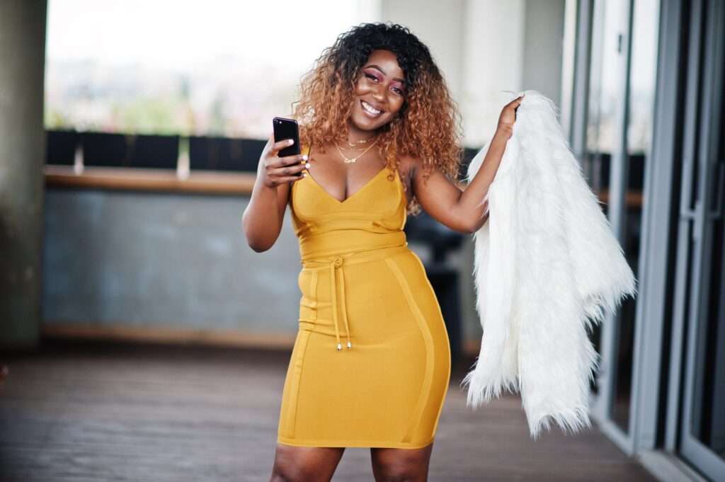 African american woman in yellow dress