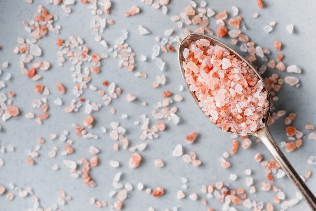 Top view of Himalayan pink salt, macro photography.